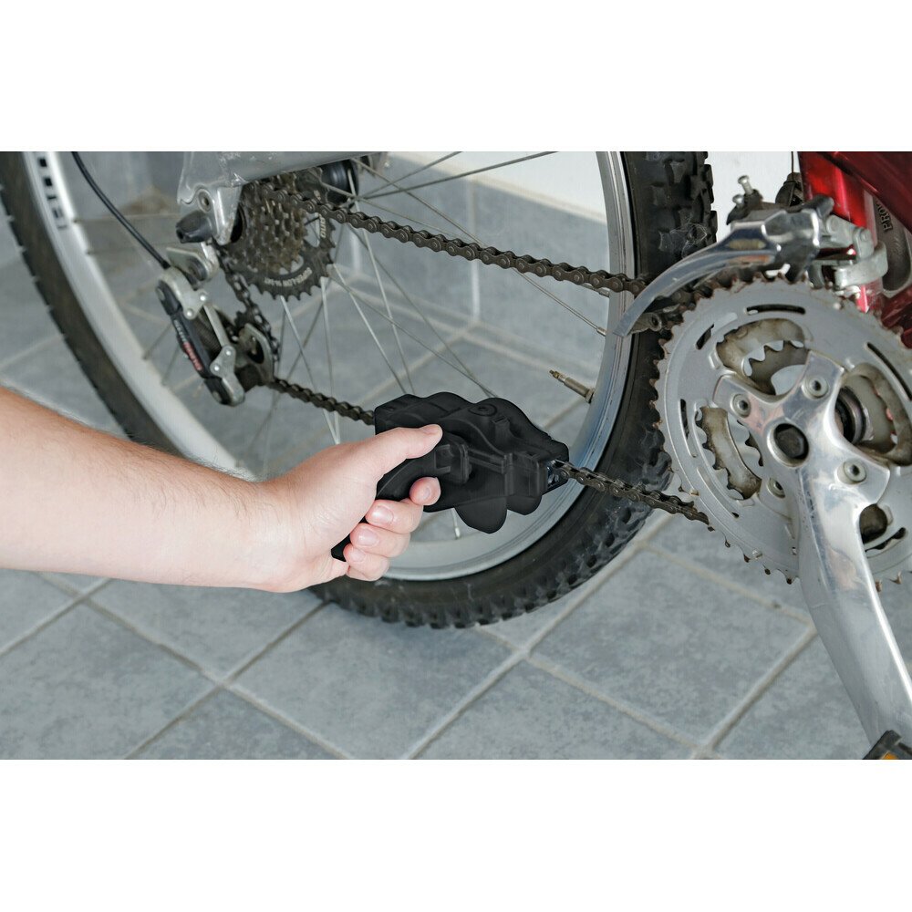 Bicycle chain cleaner thumb