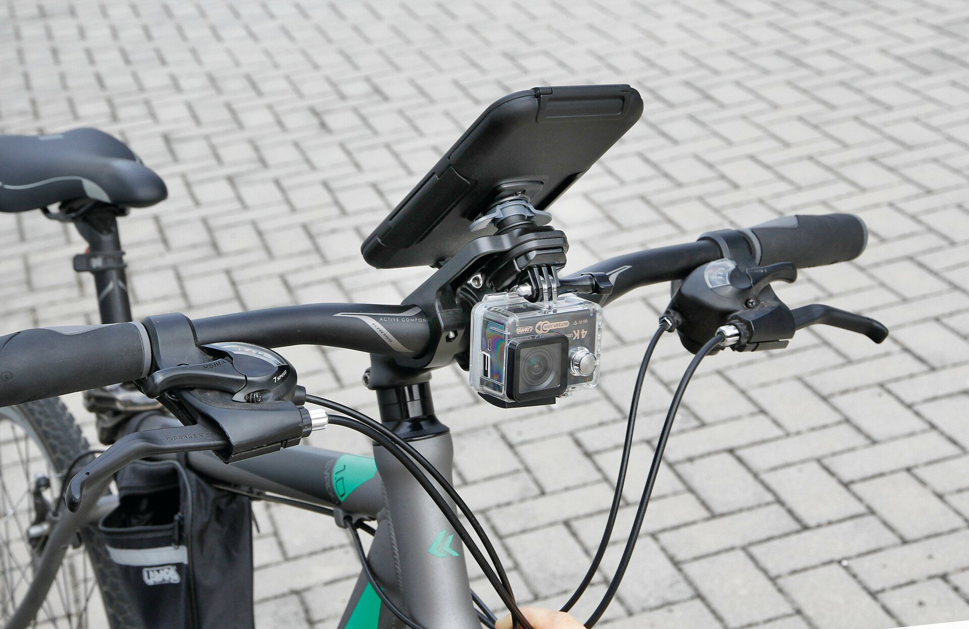 Opti Combo, handlebar fixing with action cam support thumb