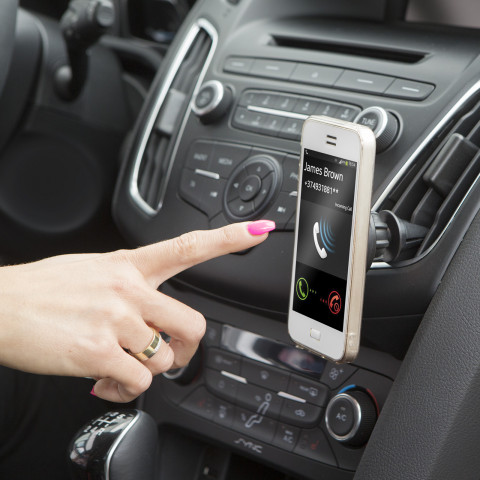 Magnetic mobile phone holder with ventilation grille mount thumb
